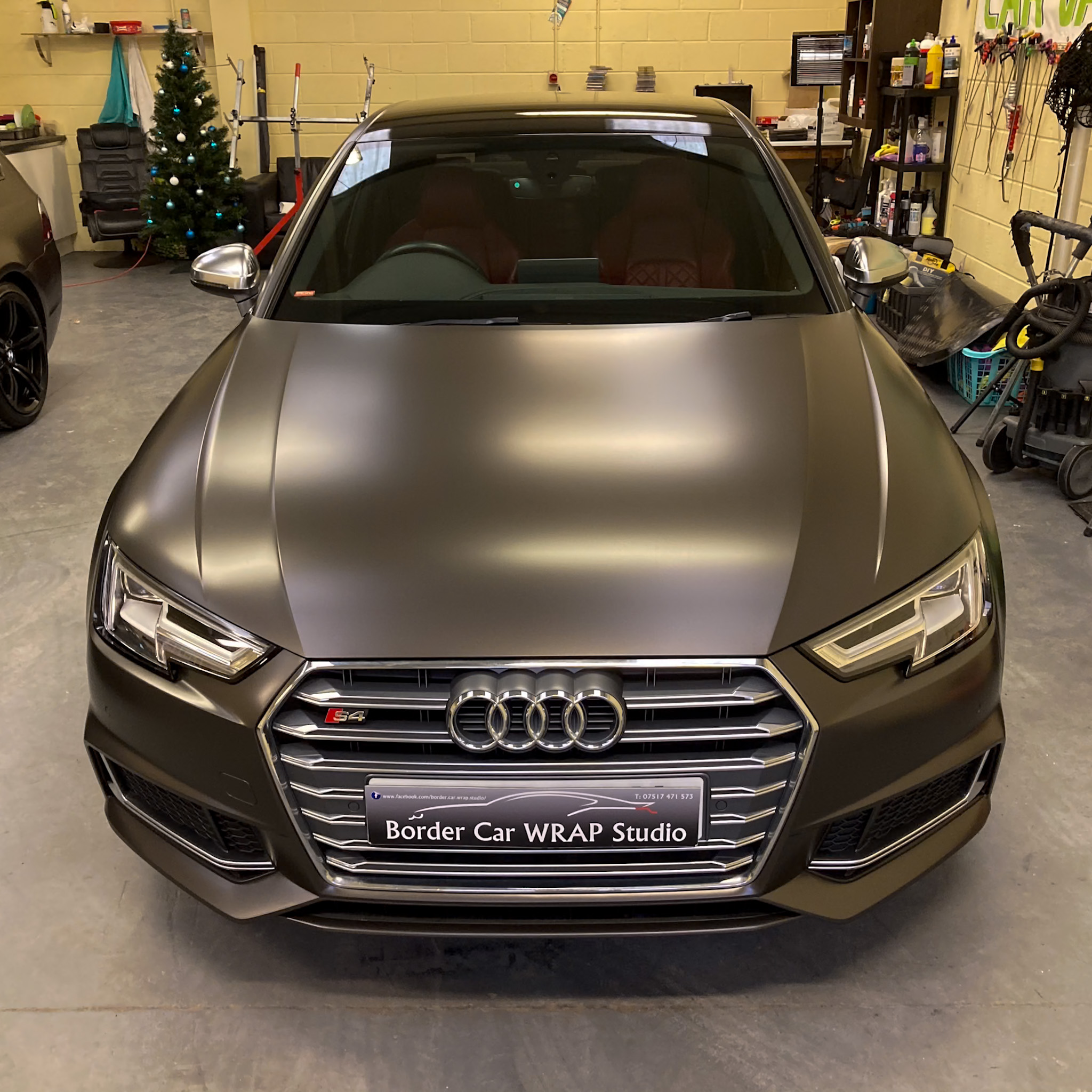 Professional car wrapping service illustrating the transformation and protection of a vehicle through vinyl application.